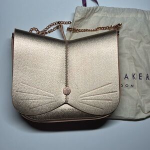 Ted baker cat bag , used , not clean inside, has little scratches outside